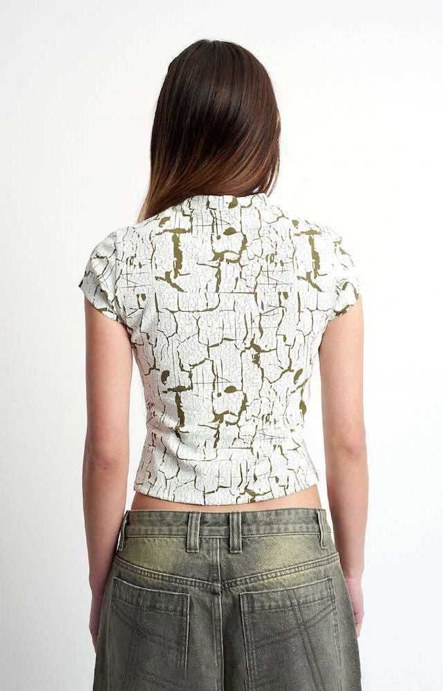 The Ragged Priest Rift Baby Tee Top by The Ragged Priest as seen on celebrities