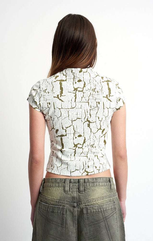 The Ragged Priest Rift Baby Tee Top by The Ragged Priest as seen on celebrities