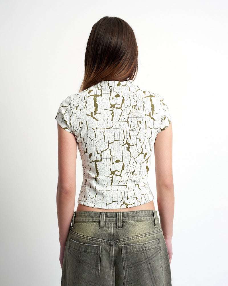 The Ragged Priest Rift Baby Tee Top by The Ragged Priest as seen on celebrities