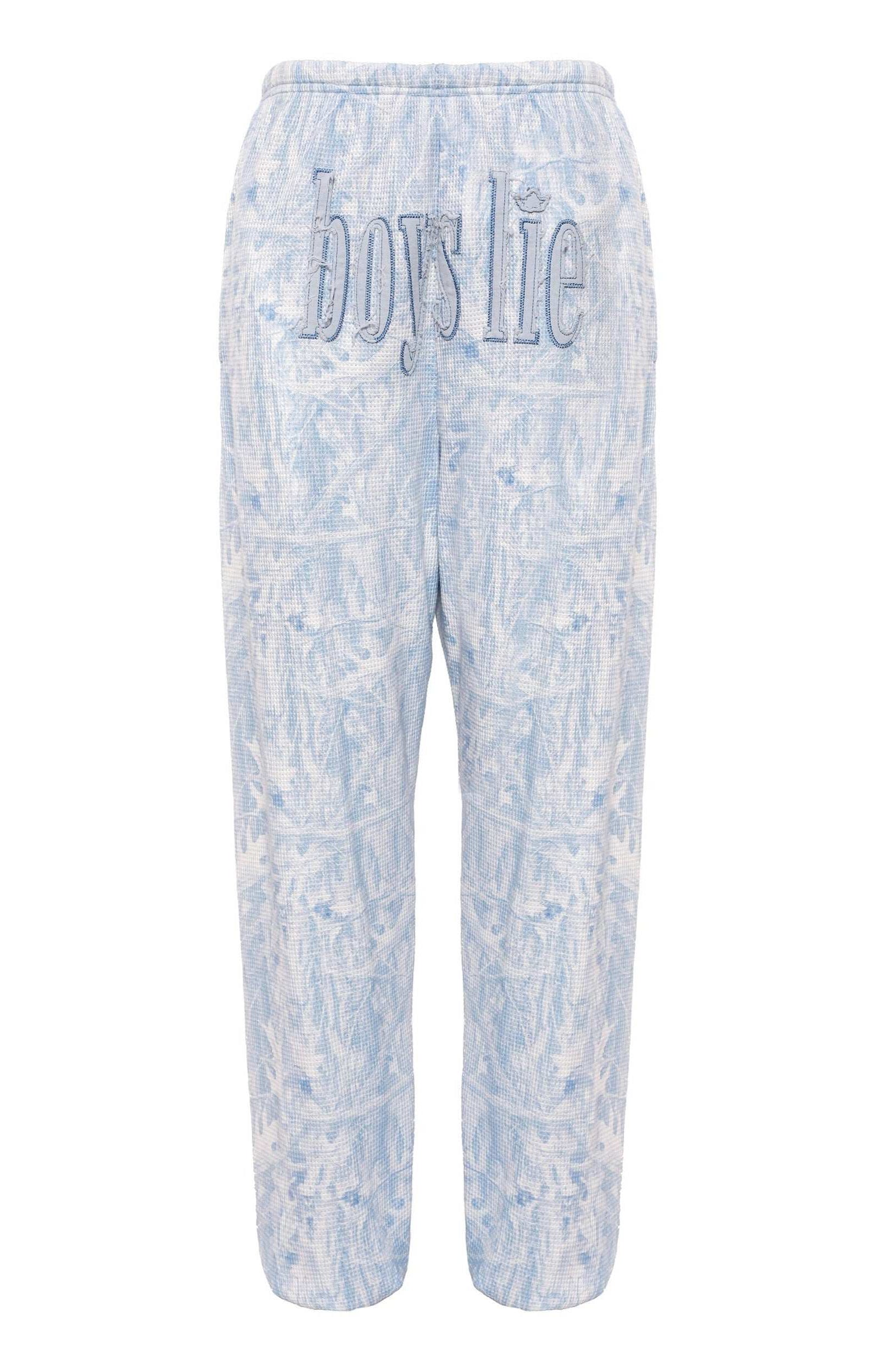 Light blue tie-dye pants with 'Boys Lie' text on a white background