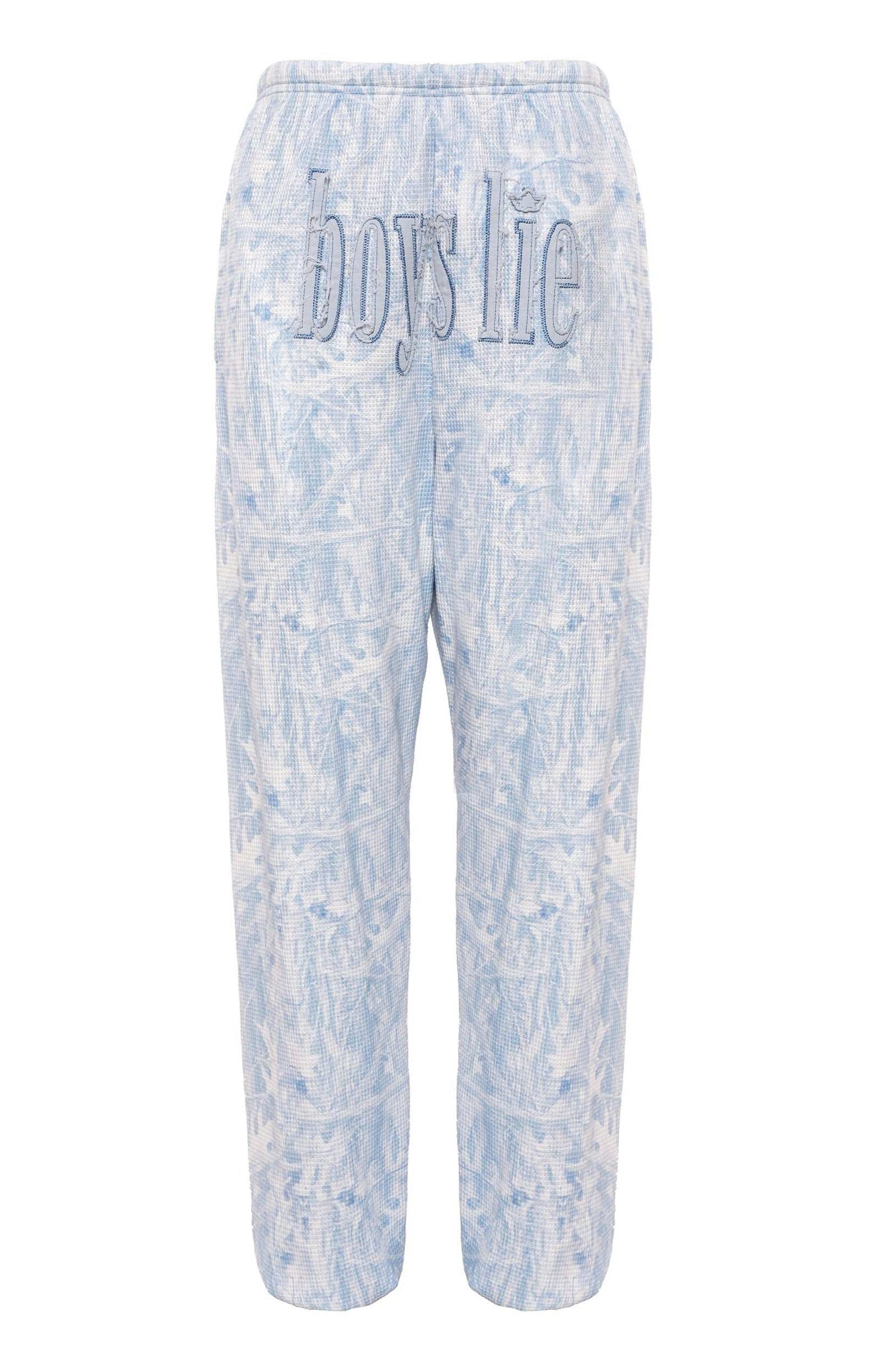 Light blue tie-dye pants with 'Boys Lie' text on a white background