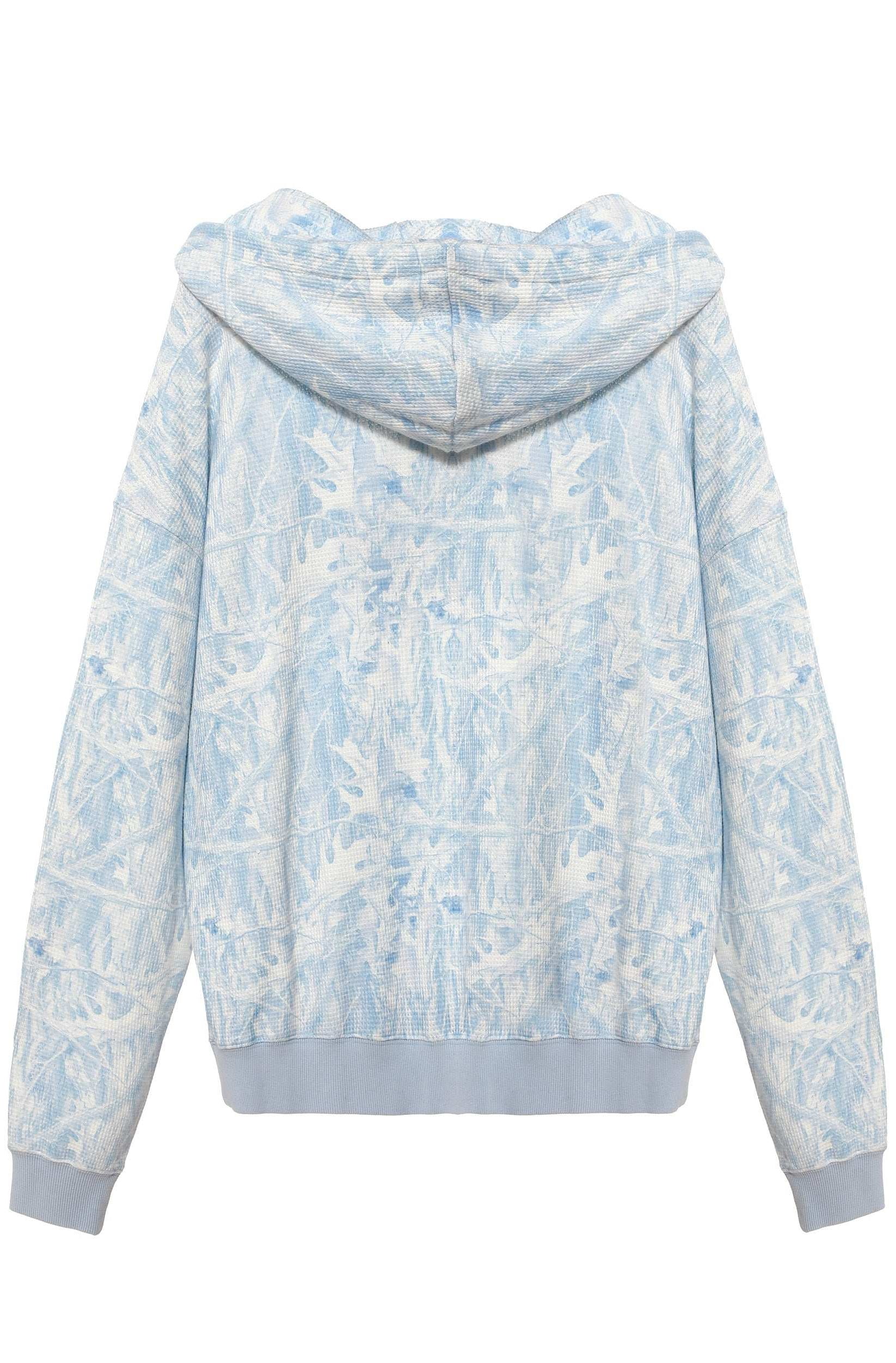 Light blue and white floral patterned hoodie on a white background