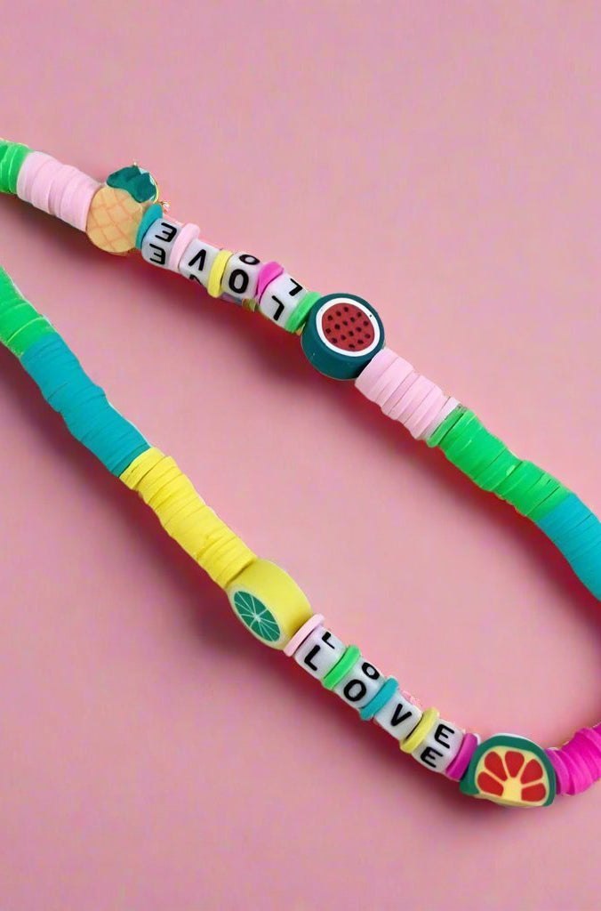 Shop Bracha Bracha Fruit Mix Phone Chain Phone Case for women – premium loungewear and festival fashion at Spoiled Brat