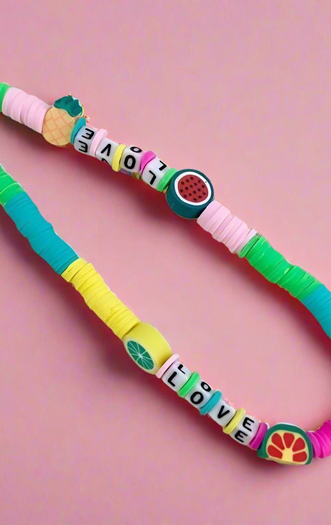 Shop Bracha Bracha Fruit Mix Phone Chain Phone Case for women – premium loungewear and festival fashion at Spoiled Brat