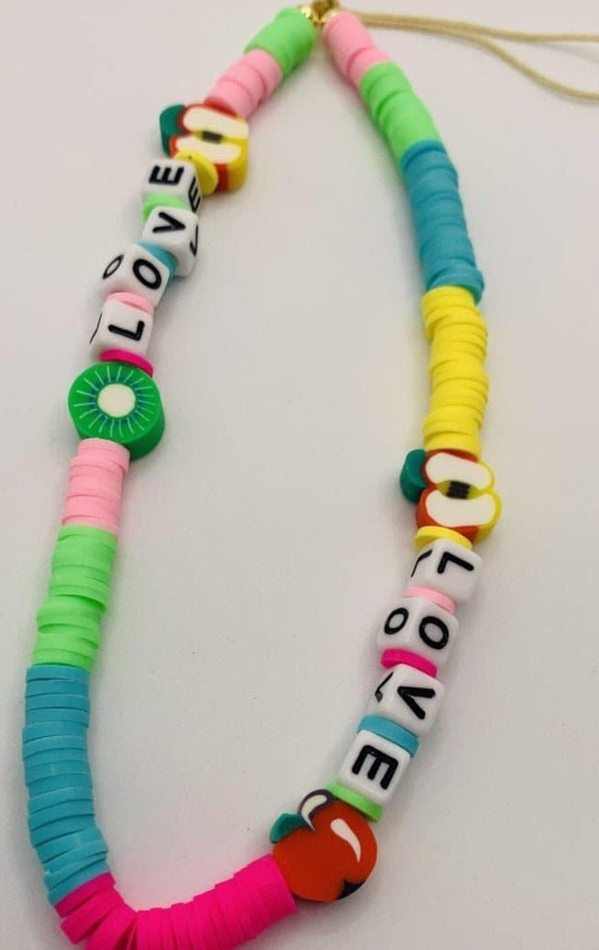 Shop Bracha Bracha Fruit Mix Phone Chain Phone Case for women – premium loungewear and festival fashion at Spoiled Brat