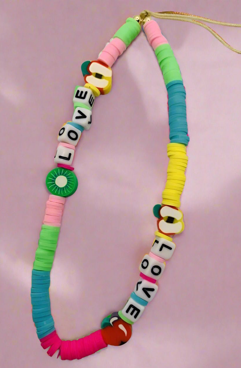 Shop Bracha Bracha Fruit Mix Phone Chain Phone Case for women – premium loungewear and festival fashion at Spoiled Brat