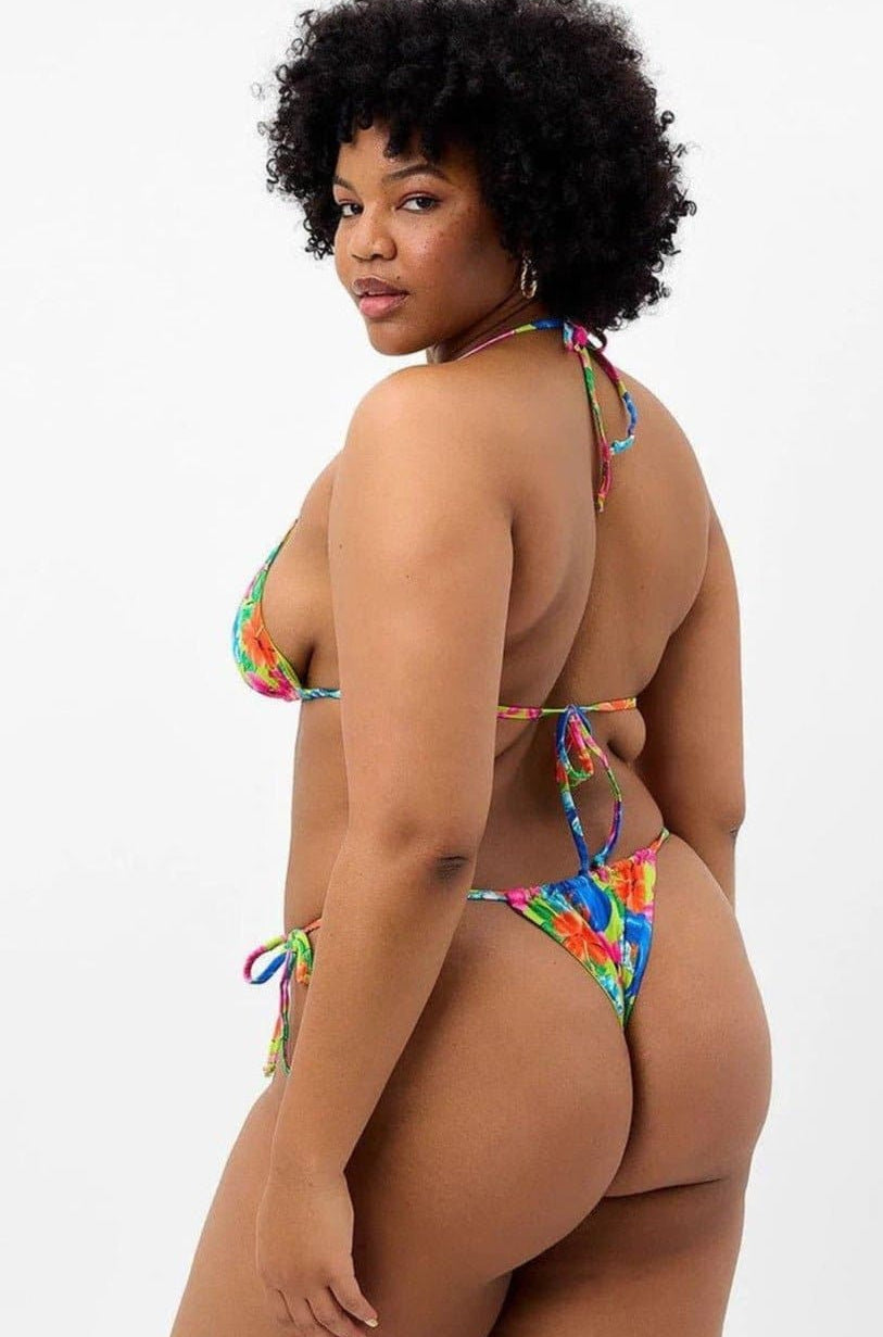 Shop Frankies Bikinis Frankies Bikinis Tia Floral String Bikini Bottom in Neon Surfer Bikini Bottoms for women – premium loungewear and festival fashion at Spoiled Brat
