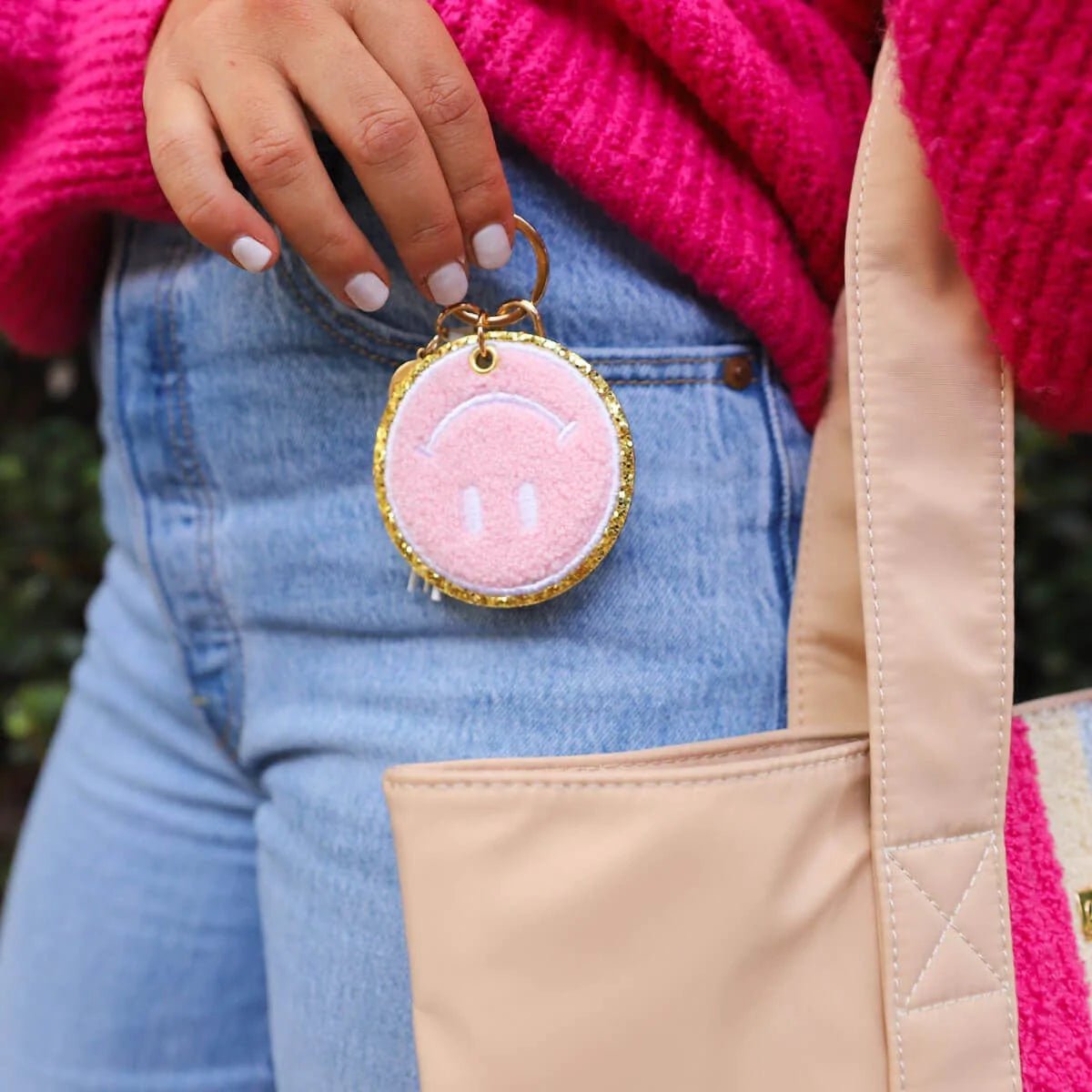 Packed Party Keep Cozy Smiley Keychain by Packed Party – Keyring – Pink | Spoiled Brat UK
