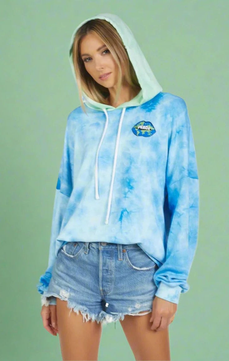 Lauren Moshi Lila World Peace Lips Hoodie as seen on Julianne Hough | Hoodie by Lauren Moshi | Shop Premium Boutique Fashion at Spoiled Brat | Trendy Y2K style. '_badge_Celeb_Pick, __label:Celeb Style, _Celeb_Pick | Image 1