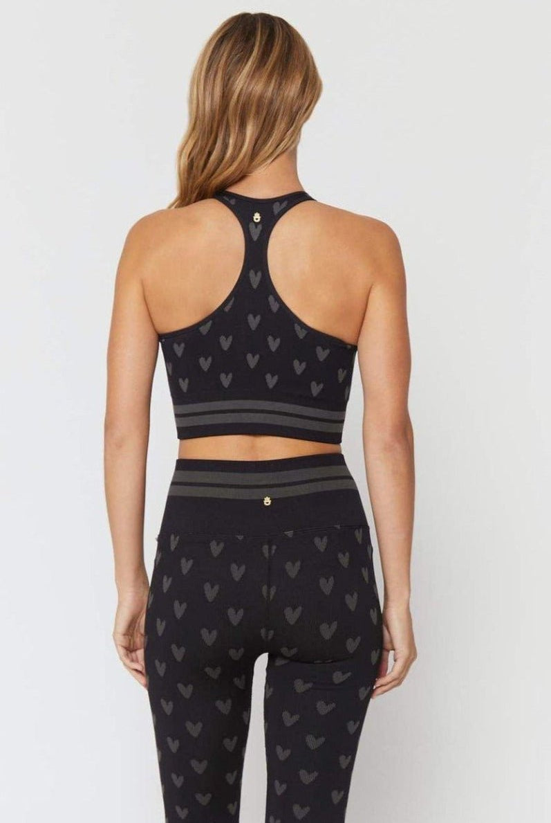 Shop Spiritual Gangster Spiritual Gangster High Neck Jacquard Seamless Black Sports Bra as seen on Miranda Cosgrove Vest Top for women – premium loungewear and festival fashion at Spoiled Brat