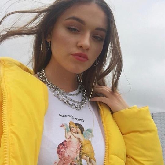 Emily Middlemas wears our Petals & Peacocks T-Shirt - Spoiled Brat 