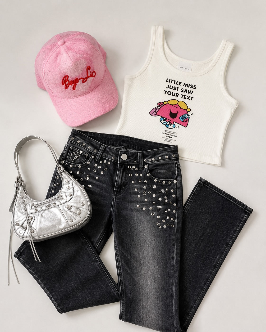 Discover the ultimate Y2K cool-girl outfit featuring The Ragged Priest studded jeans, The Laundry Room tank and a pink Boys Lie hat. Shop the look at SpoiledBrat.
