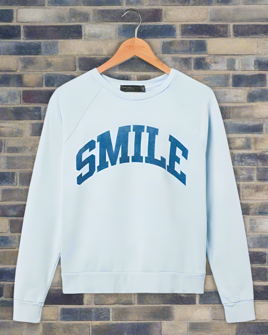 Shop Junk Food Junk Food Womens Smile Vintage Raglan Pullover online at Spoiled Brat