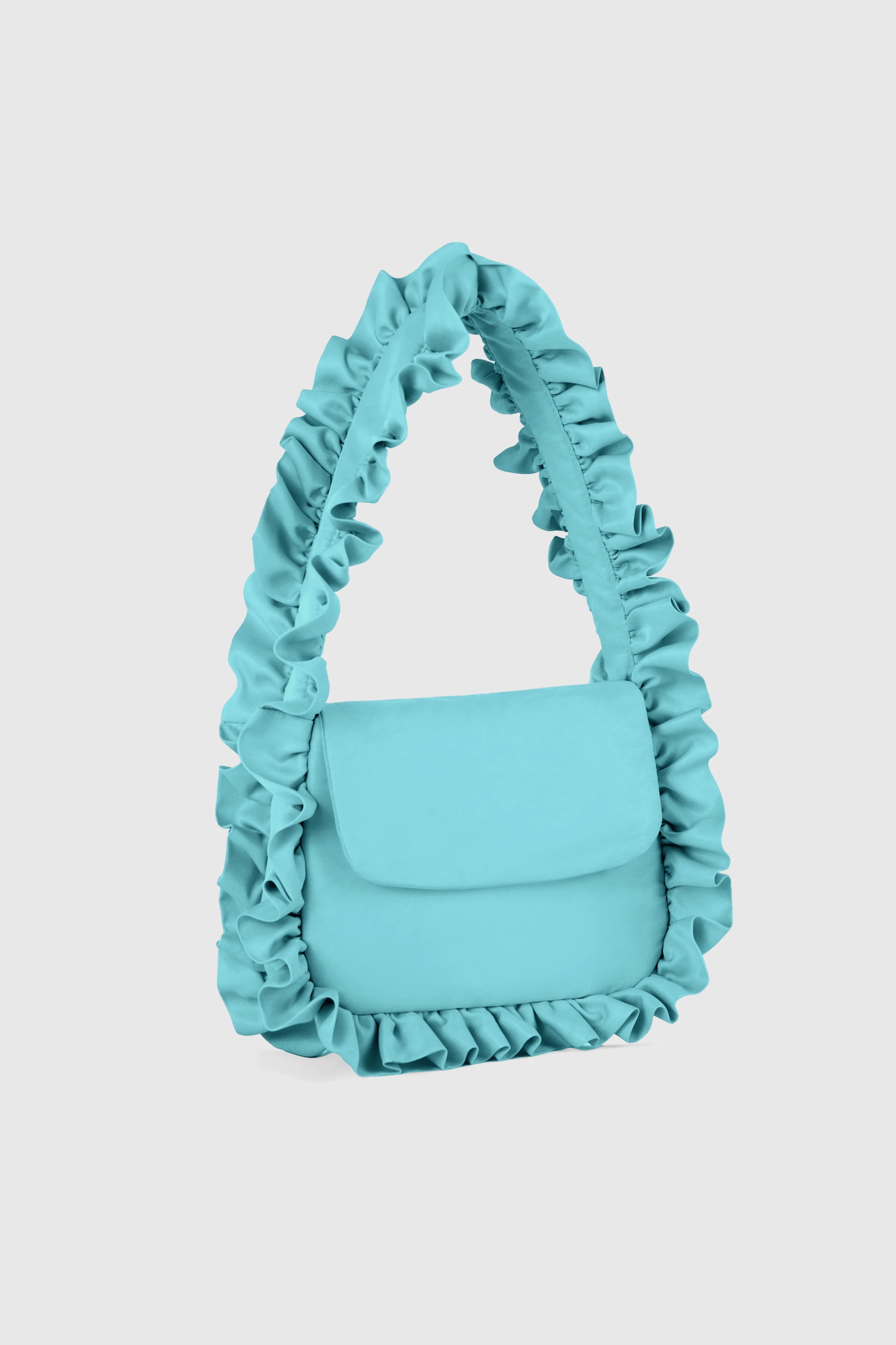 A light blue ruffled shoulder bag with a structured flap front, photographed against a solid light gray background.