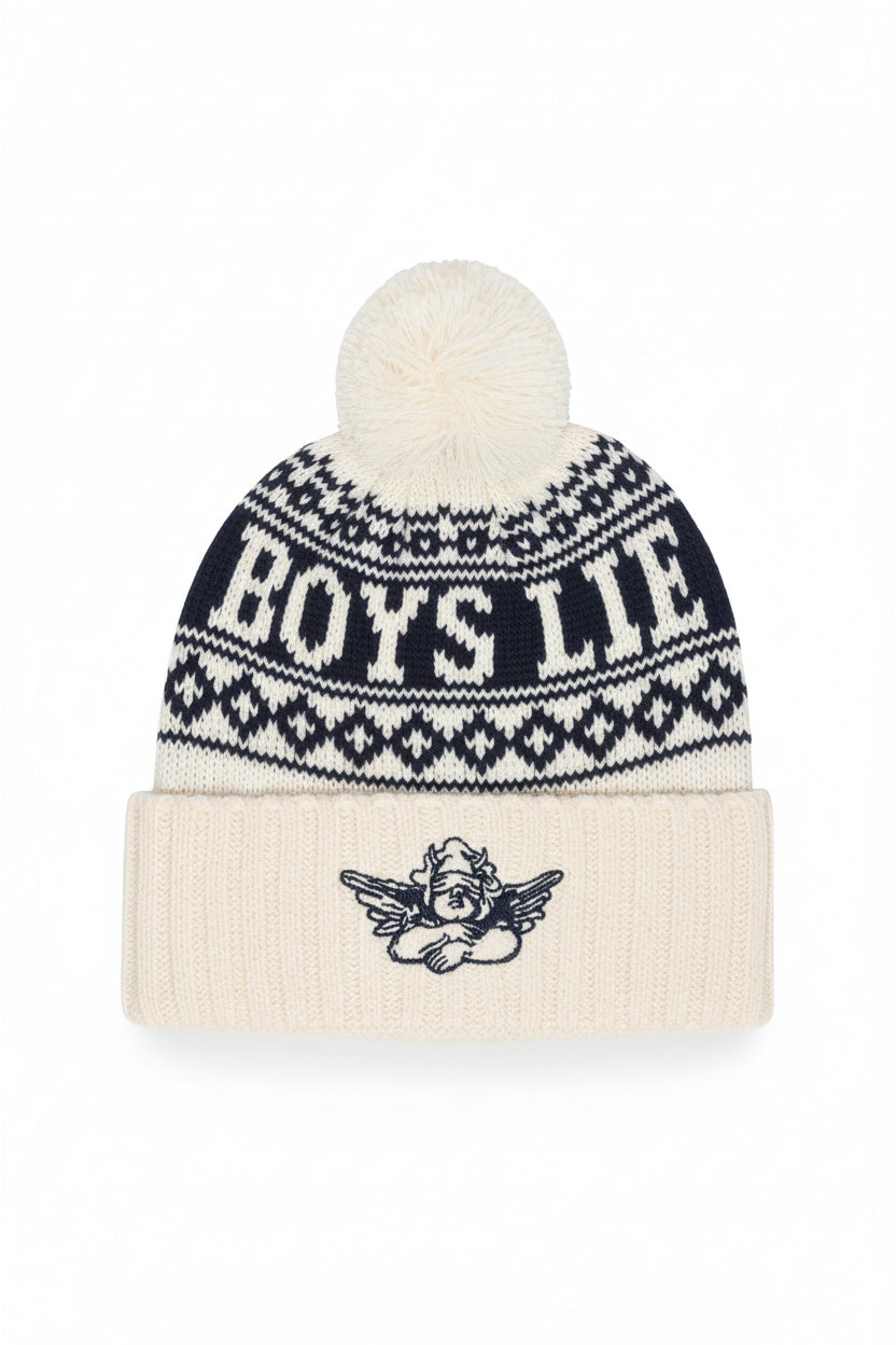 A cream and navy blue knit pom-pom beanie with 'BOYS LITE' written across the upper section and a small cherub graphic on the folded cuff.