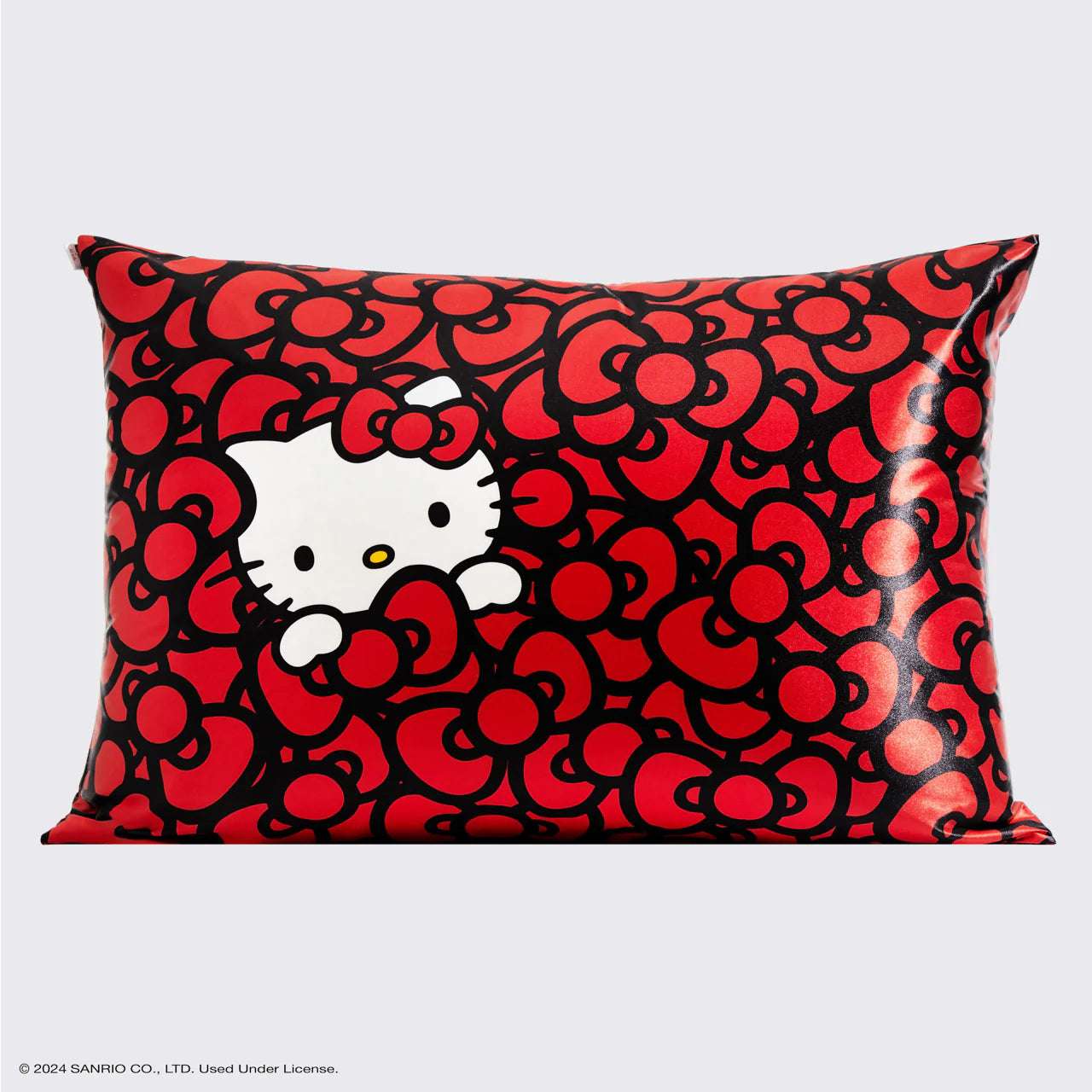 Hello Kitty x Kitsch Satin Pillowcase - Hello Kitty Bathes in a Sea of Bows Pillow by Kitsch as seen on celebrities