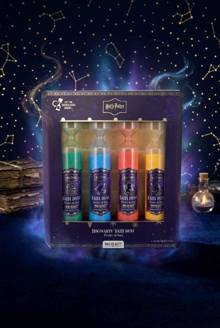 Harry Potter Hogwarts Bath Dust set in a dark purple window box with four colorful tubes of bath dust inside, shown on a white background.