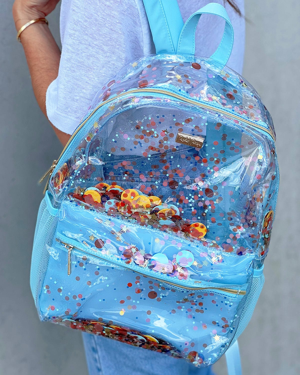 Shop Packed Party Packed Party Celebrate Confetti Clear Backpack online at Spoiled Brat