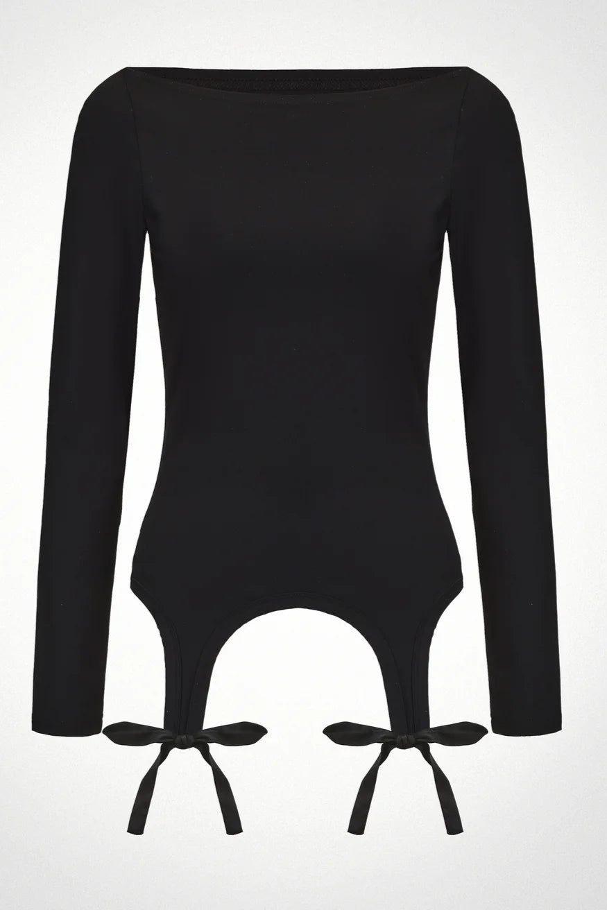 Black long-sleeve top with cut-out design and tie details on a white background