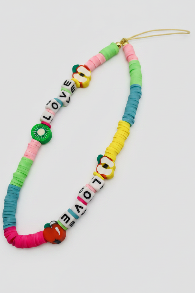 Colorful beaded necklace with 'LOVE' spelled out on a white background