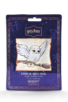 Cosmetic sheet mask packaging with owl design and Harry Potter branding on a white background