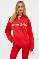 Beach Riot Alissa Santa Babe Hooded Sweater as seen on Una Healy Sweater by Beach Riot as seen on celebrities