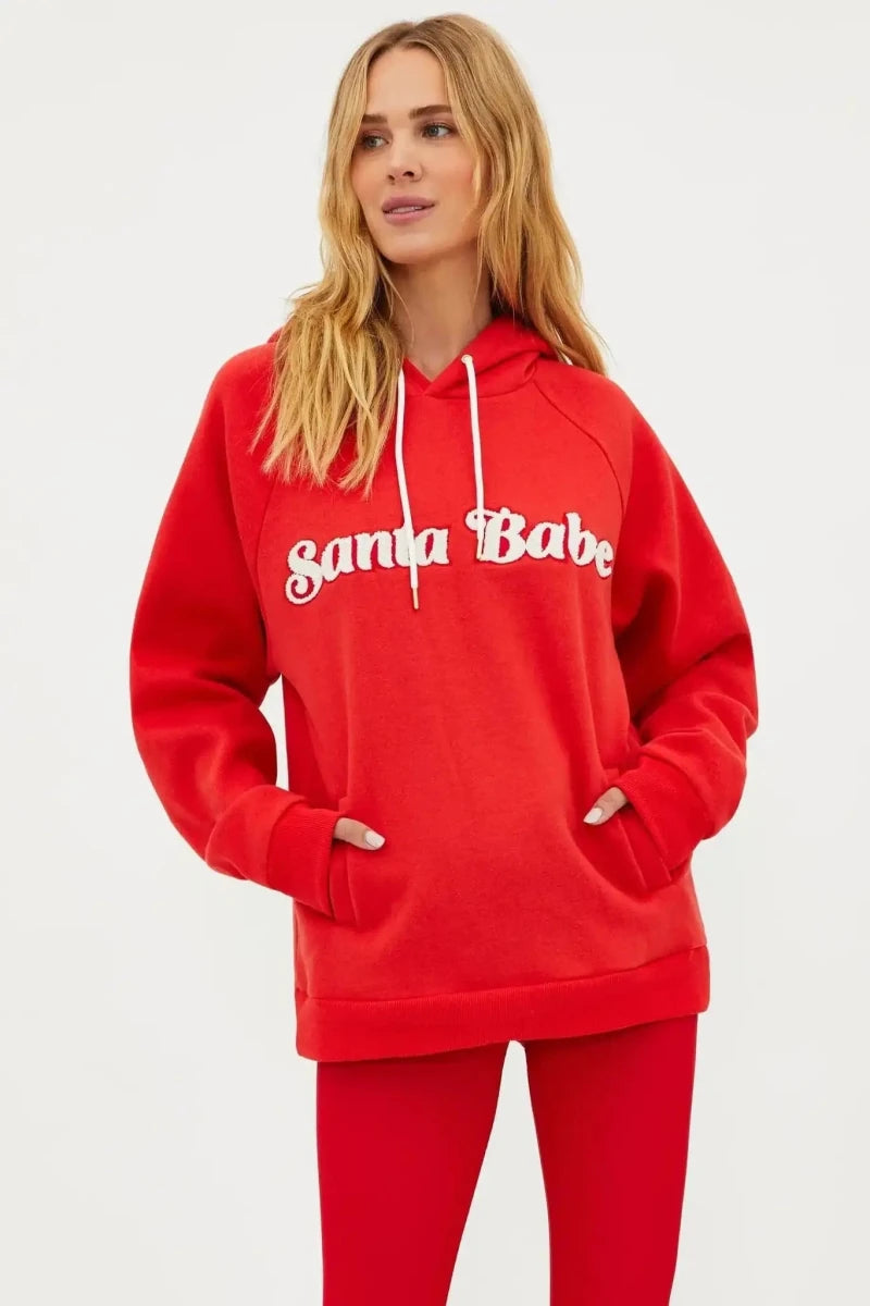 Shop Beach Riot Beach Riot Alissa Santa Babe Hooded Sweater as seen on Una Healy Sweater for women – premium loungewear and festival fashion at Spoiled Brat