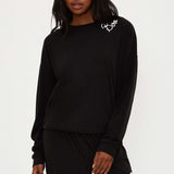 Shop Beach Riot Beach Riot Devyn Boo Black Sweatshirt Sweater for women – premium loungewear and festival fashion at Spoiled Brat