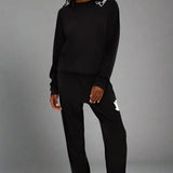 Shop Beach Riot Beach Riot Devyn Boo Black Sweatshirt Sweater for women – premium loungewear and festival fashion at Spoiled Brat
