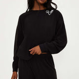 Shop Beach Riot Beach Riot Devyn Boo Black Sweatshirt Sweater for women – premium loungewear and festival fashion at Spoiled Brat