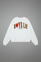 White BOYS LIE sweatshirt with colorful text on a gray background