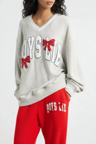 Shop Boys Lie Boys Lie Wrap Me In a Bow Hayley Sweater Sweater for women – premium loungewear and festival fashion at Spoiled Brat