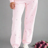 Shop Brunette The Label Brunette The Label "Be Kind" All Over Floral Oversized Joggers Sweatpants for women – premium loungewear and festival fashion at Spoiled Brat