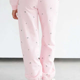 Shop Brunette The Label Brunette The Label "Be Kind" All Over Floral Oversized Joggers Sweatpants for women – premium loungewear and festival fashion at Spoiled Brat