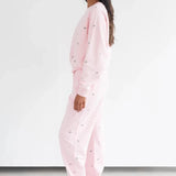 Shop Brunette The Label Brunette The Label "Be Kind" All Over Floral Perfect Crew Sweater Sweater for women – premium loungewear and festival fashion at Spoiled Brat