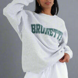 Shop Brunette The Label Brunette The Label "Brunette" Grey Varsity Hair Colour Not Your Boyfriend's Crew Sweater for women – premium loungewear and festival fashion at Spoiled Brat