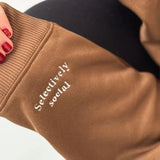 Shop Coconut Lane Coconut Lane Feelings "Selectively Social" Hoodie Hoodie for women – premium loungewear and festival fashion at Spoiled Brat