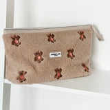 Shop Coconut Lane Coconut Lane Quilted Embroidered Theo Teddy Expandable Cosmetic Bag Cosmetic Case for women – premium loungewear and festival fashion at Spoiled Brat
