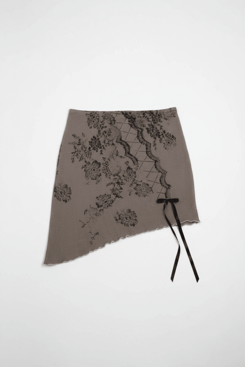 Shop Daisy Street Daisy Street Asymmetrical Skirt with Print & Bow Detail Mini Skirt for women – premium loungewear and festival fashion at Spoiled Brat