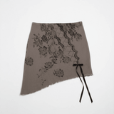 Shop Daisy Street Daisy Street Asymmetrical Skirt with Print & Bow Detail Mini Skirt for women – premium loungewear and festival fashion at Spoiled Brat