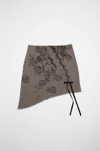 Shop Daisy Street Daisy Street Asymmetrical Skirt with Print & Bow Detail Mini Skirt for women – premium loungewear and festival fashion at Spoiled Brat
