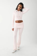 Shop Frankies Bikinis Frankies Bikinis Aimee Cloud Knit Flare Pant in Rosebud Pink Trousers for women – premium loungewear and festival fashion at Spoiled Brat