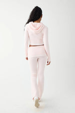 Shop Frankies Bikinis Frankies Bikinis Aimee Cloud Knit Flare Pant in Rosebud Pink Trousers for women – premium loungewear and festival fashion at Spoiled Brat