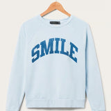 Shop Junk Food Junk Food Womens Smile Vintage Raglan Pullover T-Shirt for women – premium loungewear and festival fashion at Spoiled Brat