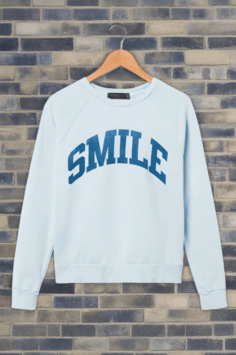 Shop Junk Food Junk Food Womens Smile Vintage Raglan Pullover T-Shirt for women – premium loungewear and festival fashion at Spoiled Brat