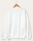 Shop Junk Food JUNKFOOD Peanuts Seasons Greetings Christmas Jumper Jumper for women – premium loungewear and festival fashion at Spoiled Brat