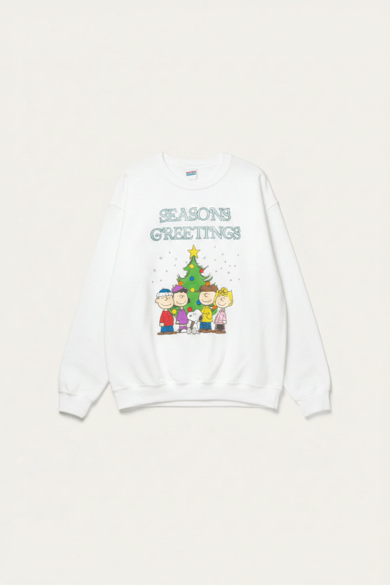 Shop Junk Food JUNKFOOD Peanuts Seasons Greetings Christmas Jumper Jumper for women – premium loungewear and festival fashion at Spoiled Brat
