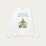 Shop Junk Food JUNKFOOD Peanuts Seasons Greetings Christmas Jumper Jumper for women – premium loungewear and festival fashion at Spoiled Brat
