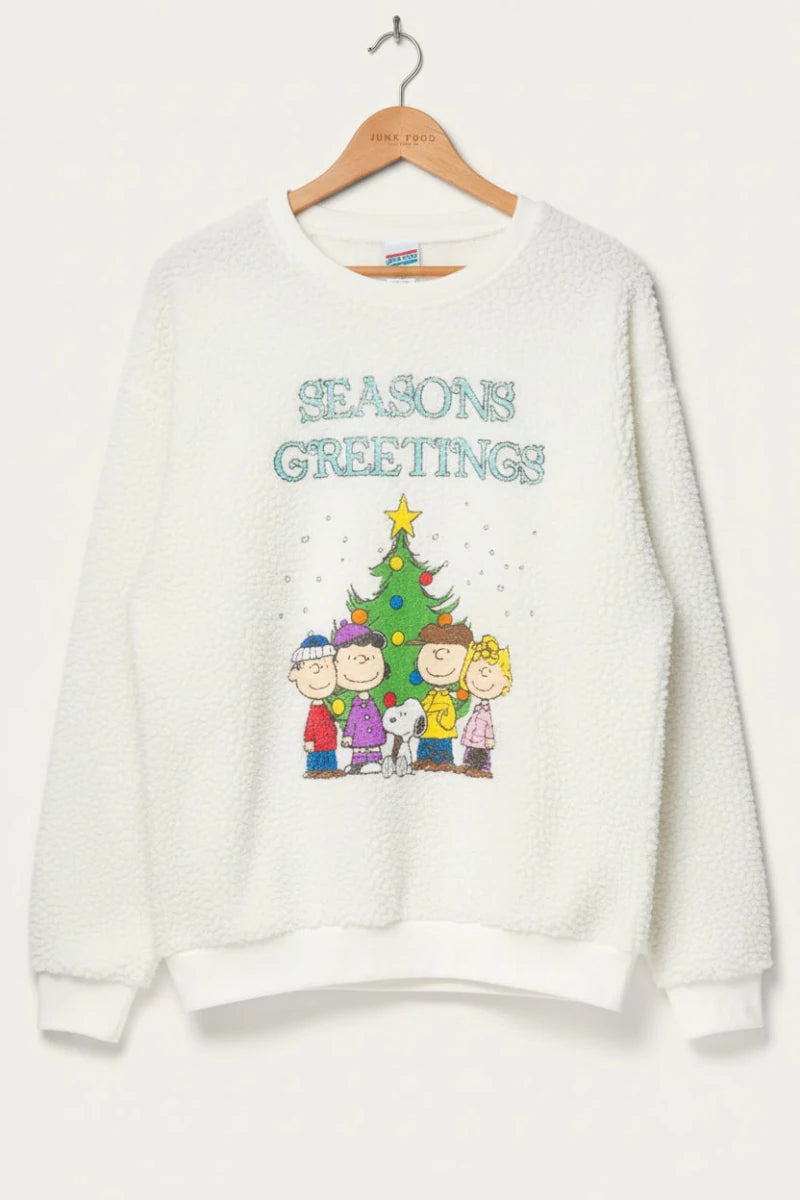 Shop Junk Food JUNKFOOD Peanuts Seasons Greetings Christmas Jumper Jumper for women – premium loungewear and festival fashion at Spoiled Brat