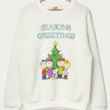 Shop Junk Food JUNKFOOD Peanuts Seasons Greetings Christmas Jumper Jumper for women – premium loungewear and festival fashion at Spoiled Brat